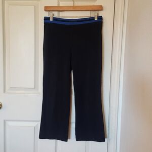 Danskin black capri pants with blue waistband